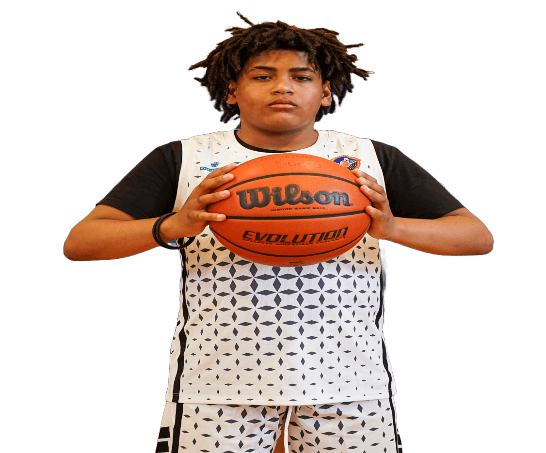 Boy player holding a basketball